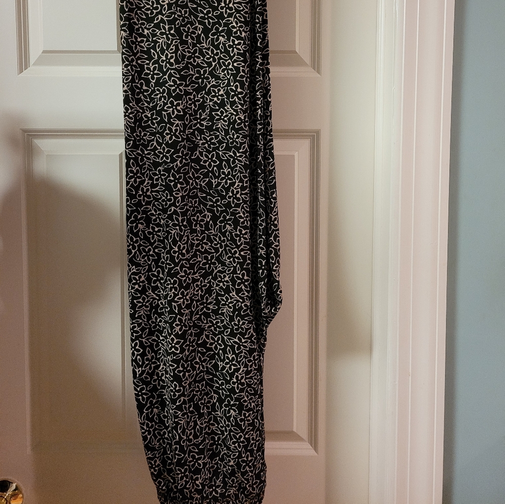 Woman's black/tan stretch size M slacks...slacks have an elastic waistband.